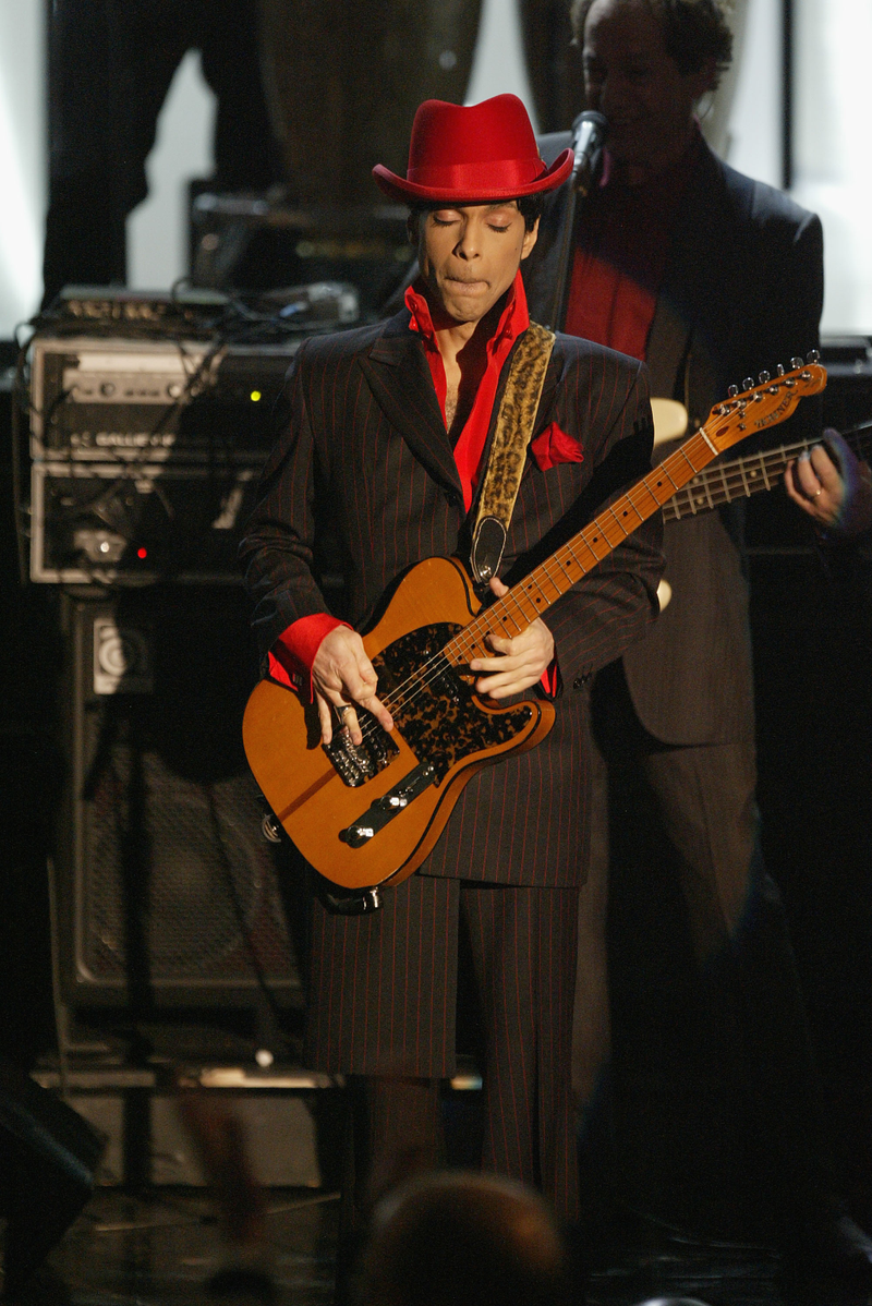 Prince performs following George Harrison’s induction at the Rock & Roll Hall of Fame 19th Annual Induction Dinner at the Waldorf Astoria hotel in New York City on March 15, 2004.Frank Micelotta/Getty Images